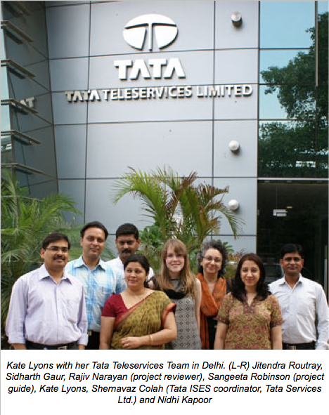 Kate Lyons outside Tata Teleservices Limited with Tata Team